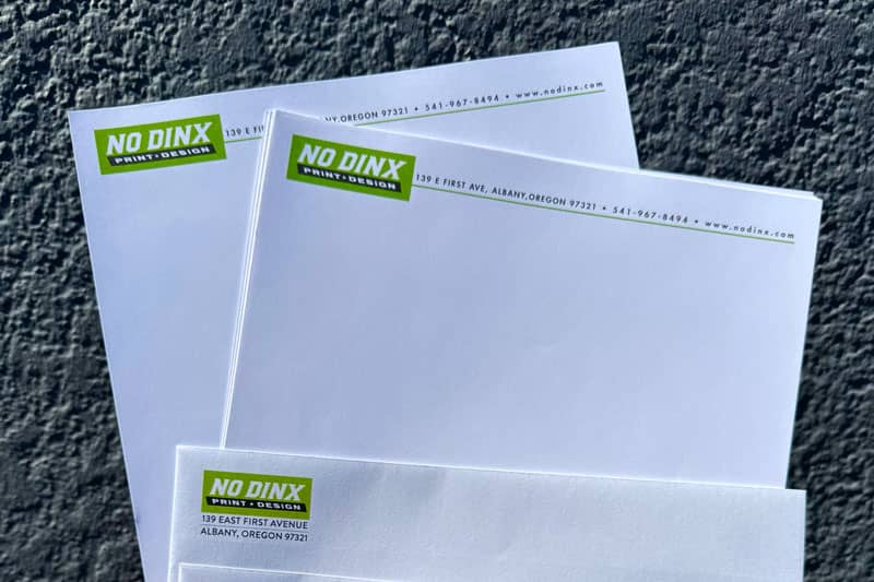 Hanging Storefront Sign Branded for No Dinx